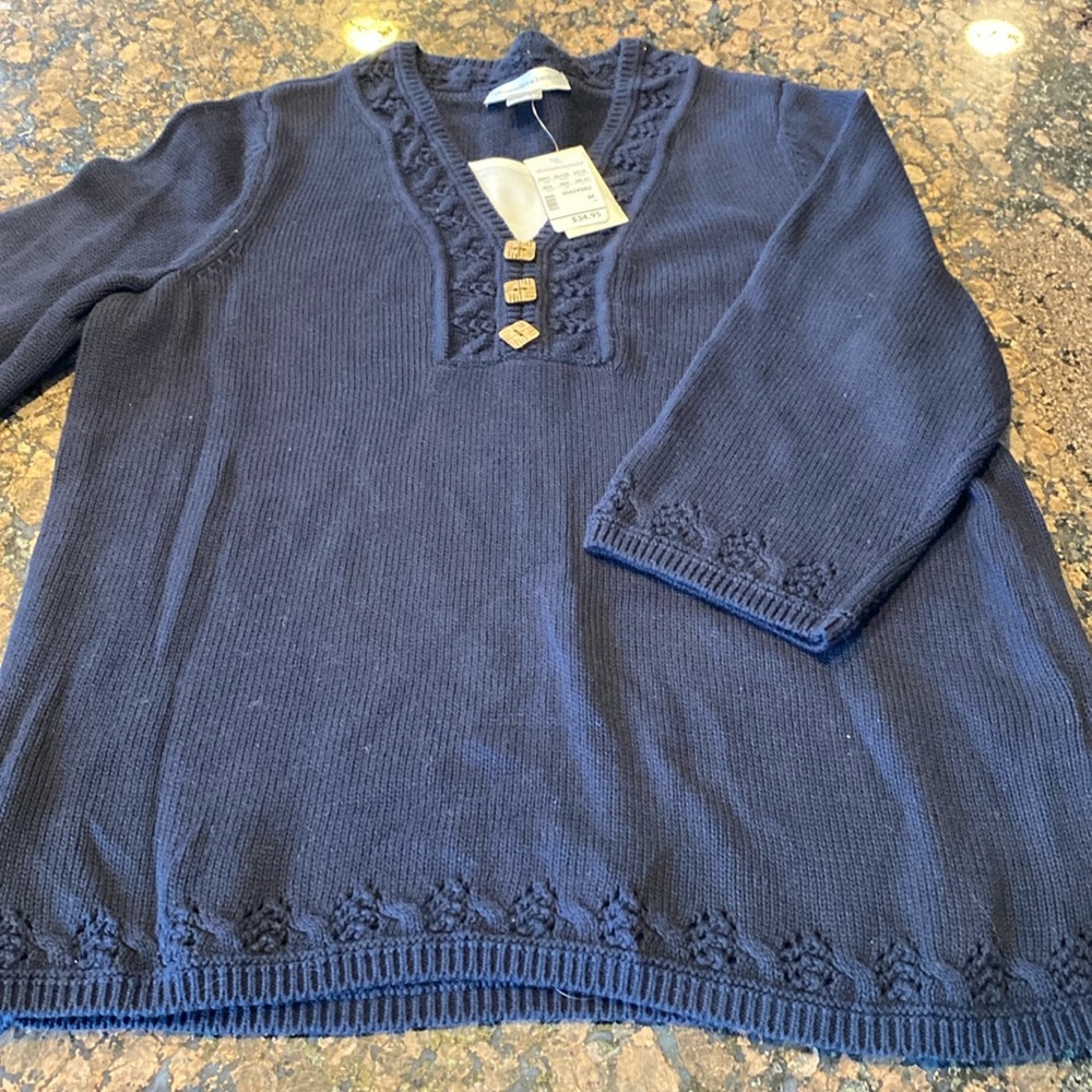 Brand new with tags. Women’s medium Christopher and Banks v neck sweater.